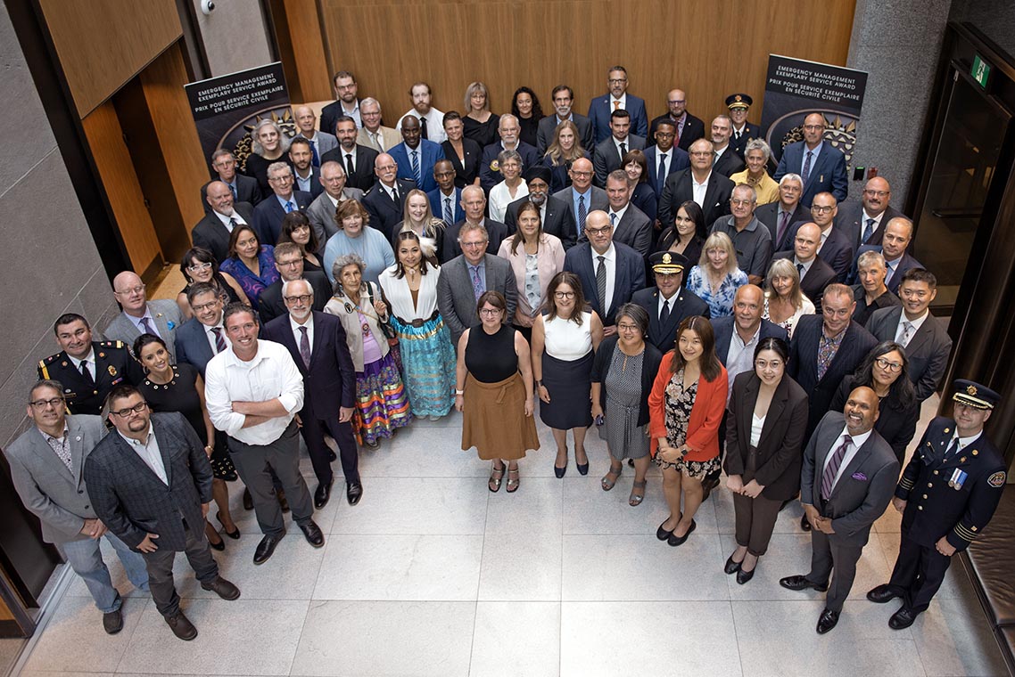 The Honourable Harjit S. Sajjan, President of the King's Privy Council for Canada and Minister of Emergency Preparedness and Minister responsible for the Pacific Economic Development Agency of Canada, and the Honourable Bloyce Thompson, Deputy Premier, Minister of Justice and Public Safety and Attorney General for Prince Edward Island are pictured with the 2022 award recipients of the Emergency Management Exemplary Service Award.