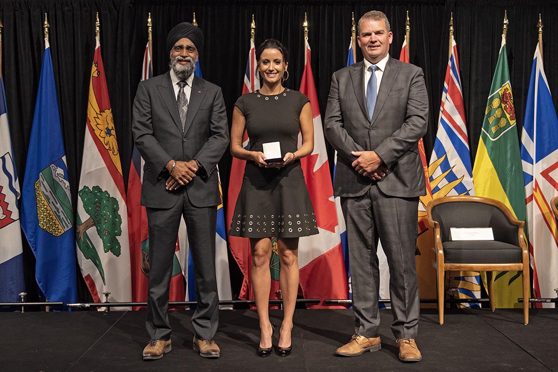 The Honourable Harjit S. Sajjan, President of the King's Privy Council for Canada and Minister of Emergency Preparedness (far left) and Minister responsible for the Pacific Economic Development Agency of Canada, and the Honourable Bloyce Thompson, Deputy Premier, Minister of Justice and Public Safety and Attorney General for Prince Edward Island (far right) are pictured with the 2022 award recipient of the Emergency Management Exemplary Service Award for the Outstanding Contribution to Emergency Management category.