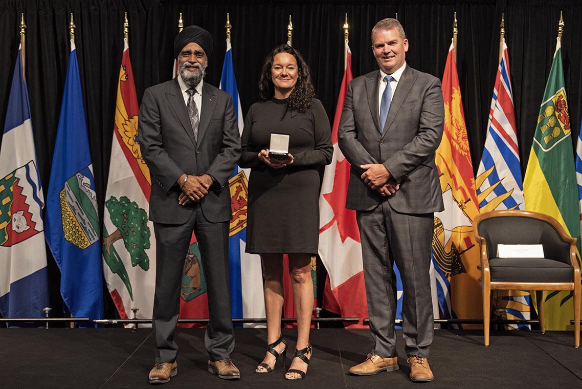 The Honourable Harjit S. Sajjan, President of the King's Privy Council for Canada and Minister of Emergency Preparedness (far left) and Minister responsible for the Pacific Economic Development Agency of Canada, and the Honourable Bloyce Thompson, Deputy Premier, Minister of Justice and Public Safety and Attorney General for Prince Edward Island (far right) are pictured with the 2022 award recipient of the Emergency Management Exemplary Service Award for the Resilient Communities category.
