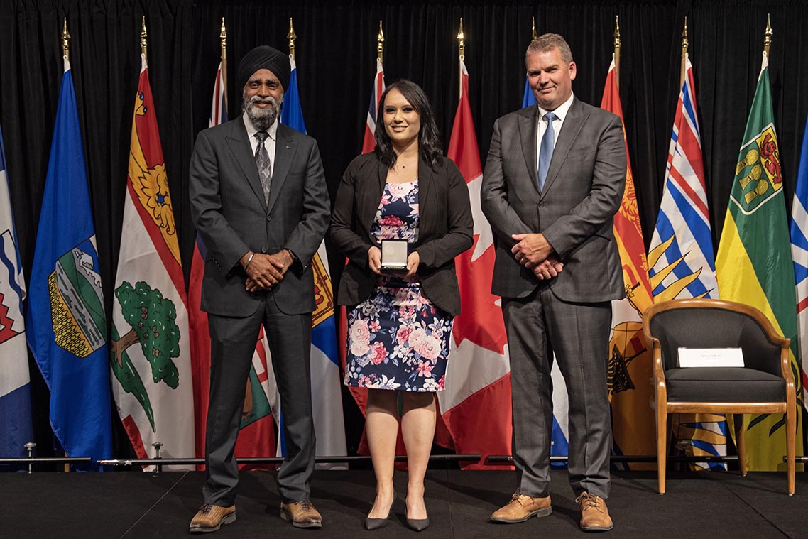 The Honourable Harjit S. Sajjan, President of the King's Privy Council for Canada and Minister of Emergency Preparedness (far left) and Minister responsible for the Pacific Economic Development Agency of Canada, and the Honourable Bloyce Thompson, Deputy Premier, Minister of Justice and Public Safety and Attorney General for Prince Edward Island (far right) are pictured with the 2022 award recipient of the Emergency Management Exemplary Service Award for the Resilient Communities category.