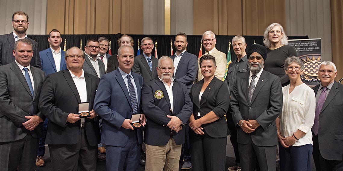 The Honourable Harjit S. Sajjan, President of the King's Privy Council for Canada and Minister of Emergency Preparedness and Minister responsible for the Pacific Economic Development Agency of Canada, and the Honourable Bloyce Thompson, Deputy Premier, Minister of Justice and Public Safety and Attorney General for Prince Edward Island are pictured with the 2022 award recipient of the Emergency Management Exemplary Service Award for the Search and Rescue Volunteers category.